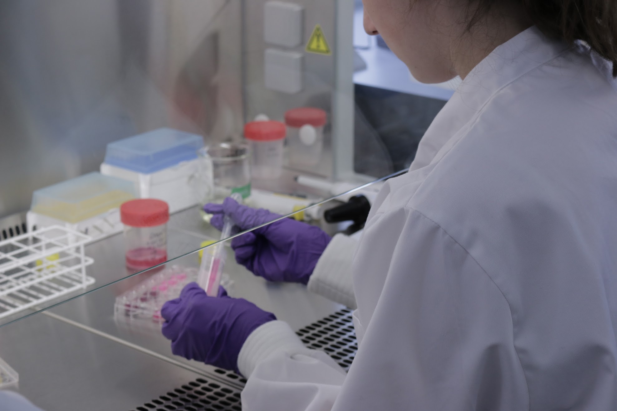 A student takes a sample in a test tube